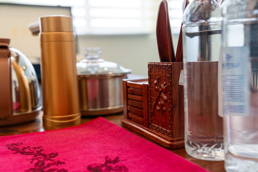 Fine tea set and cutlery on table at Royal Legend restaurant, Legend Hotel & Resort Sihanoukville.