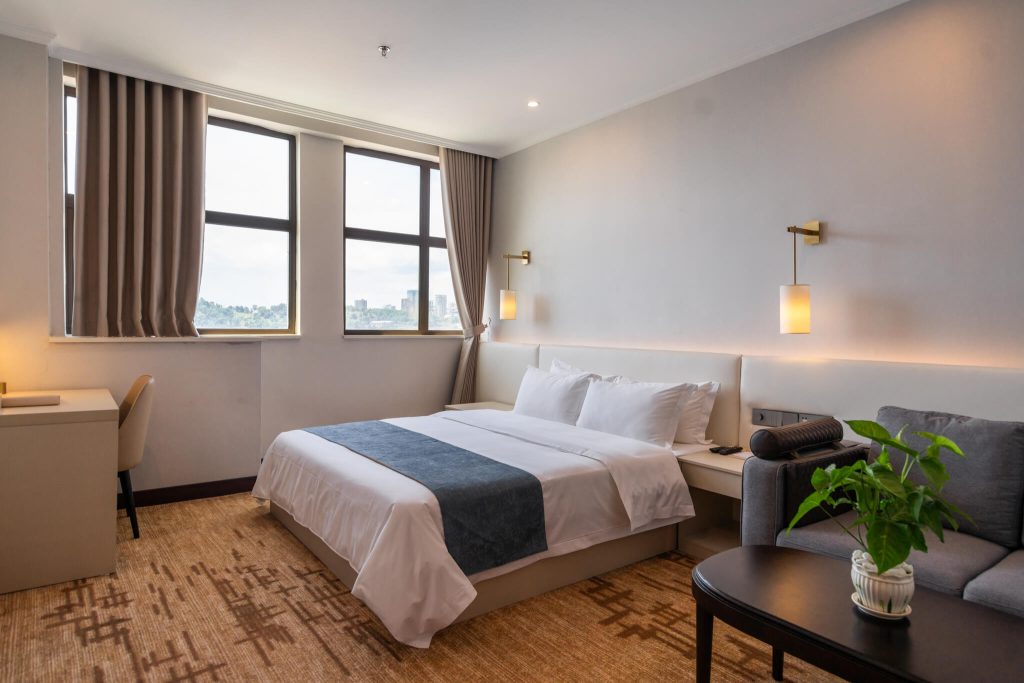 Legend Hotel & Resort Sihanoukville Deluxe King Room, another view of comfortable sleeping area.